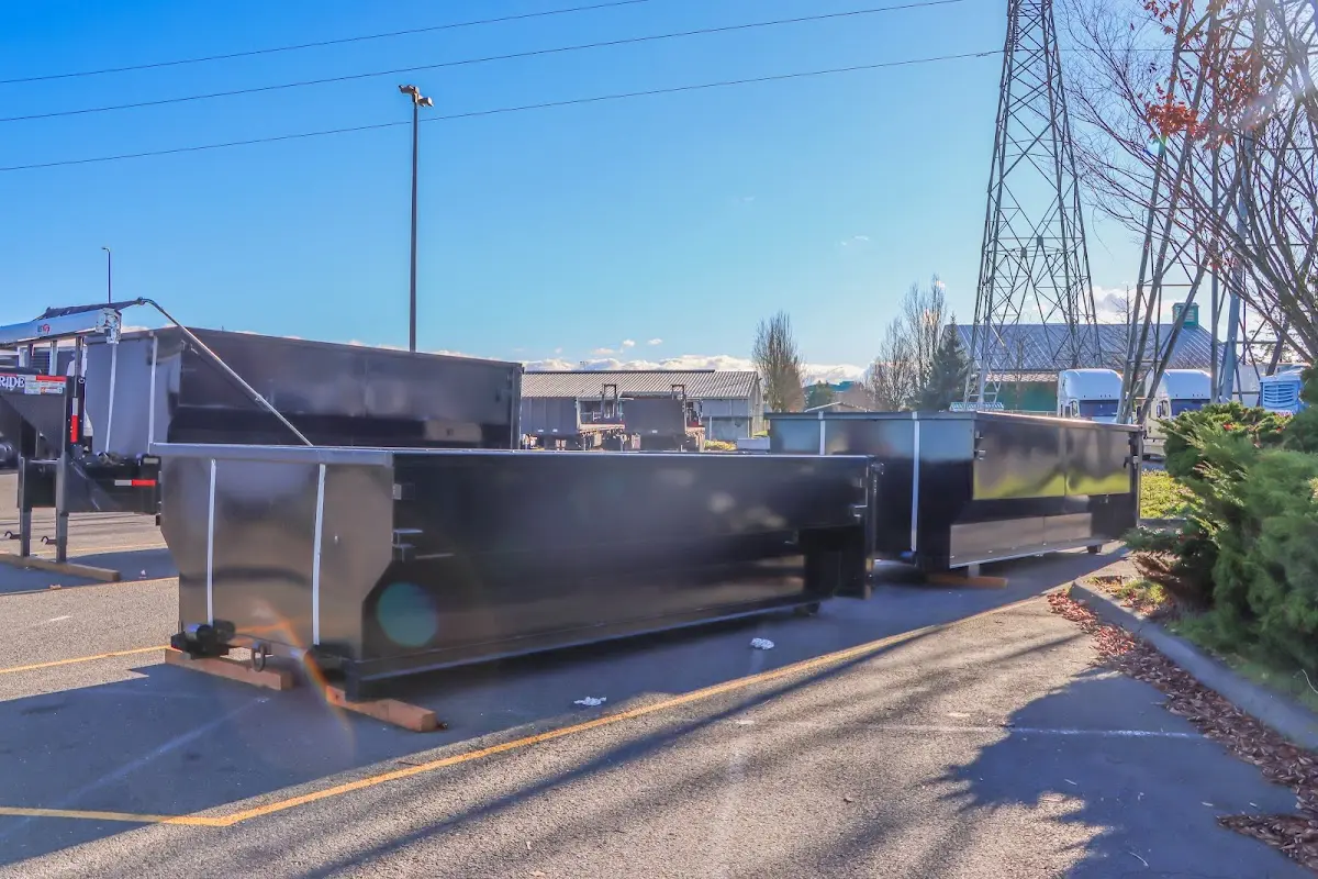 Roll-off dumpster ready for waste disposal at job site for Yard Waste Dumpster Rental in Bangor Base